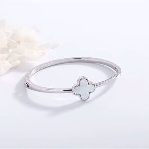 NWOT Stainless Steel Mother of Pearl Clover Bangle
Bracelet in Silver
